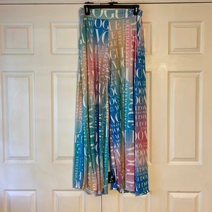 Multi-Vogue print wide leg palazzo pants.